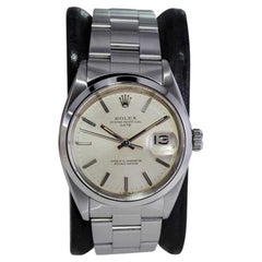 Rolex Steel Oyster Perpetual Date with Original Silver Dial and Papers 1960's