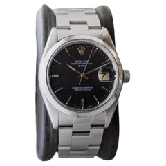 Rolex Steel Oyster Perpetual Date with Rare Flawless Black Dial circa, 1970's