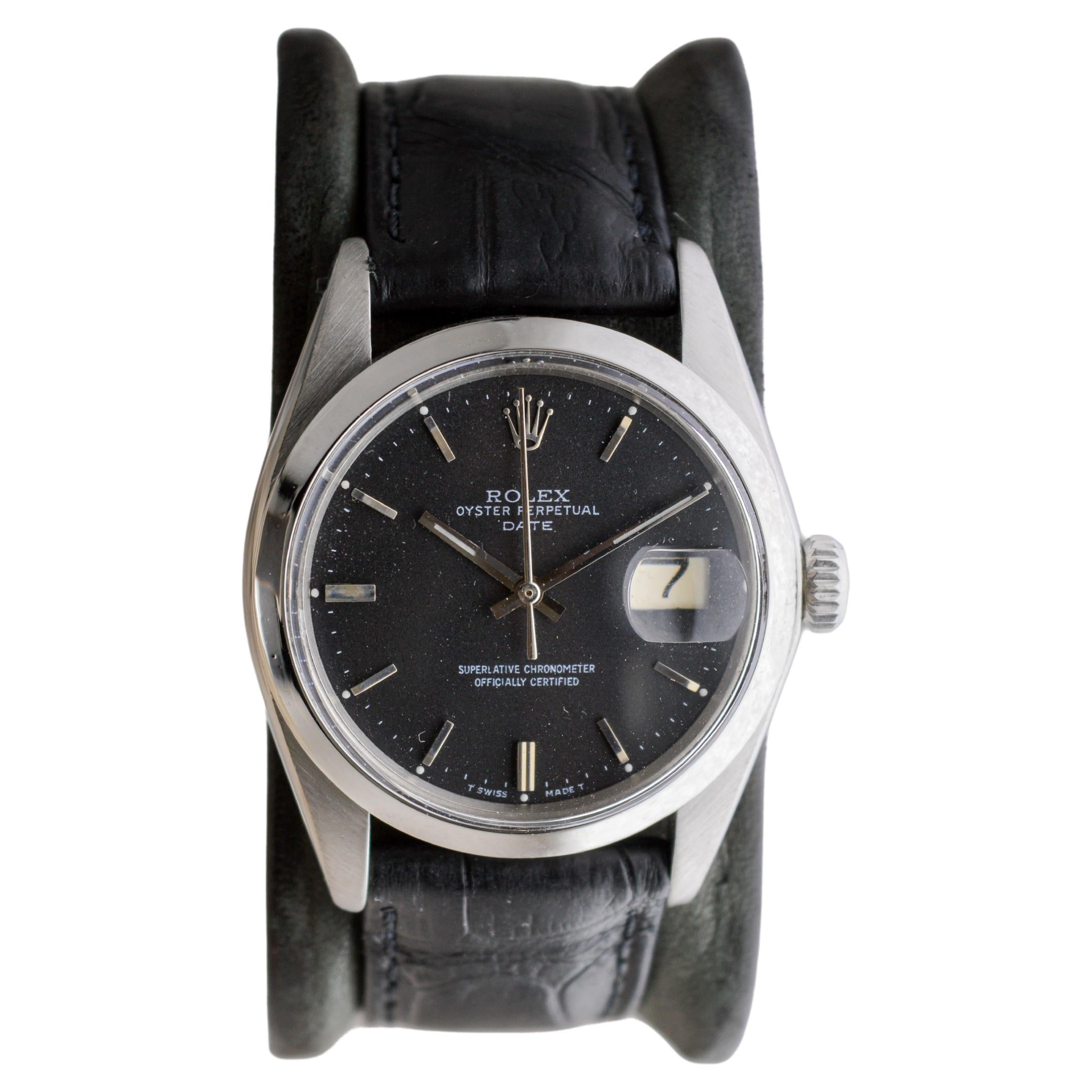 Modern Rolex Steel Oyster Perpetual Date with Rare Flawless Black Dial circa, 1970's For Sale