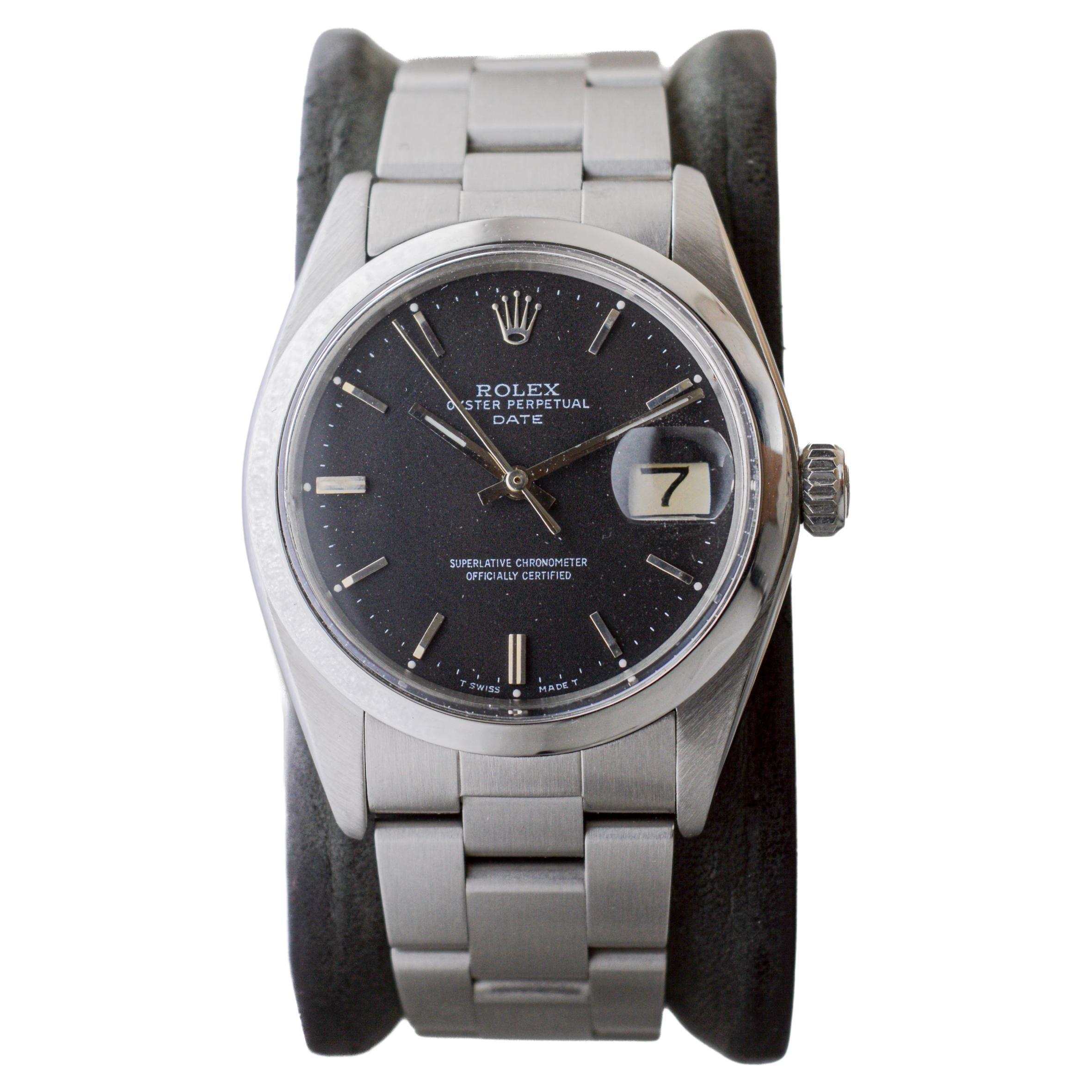 Rolex Steel Oyster Perpetual Date with Rare Flawless Black Dial circa, 1970's In Excellent Condition For Sale In Long Beach, CA
