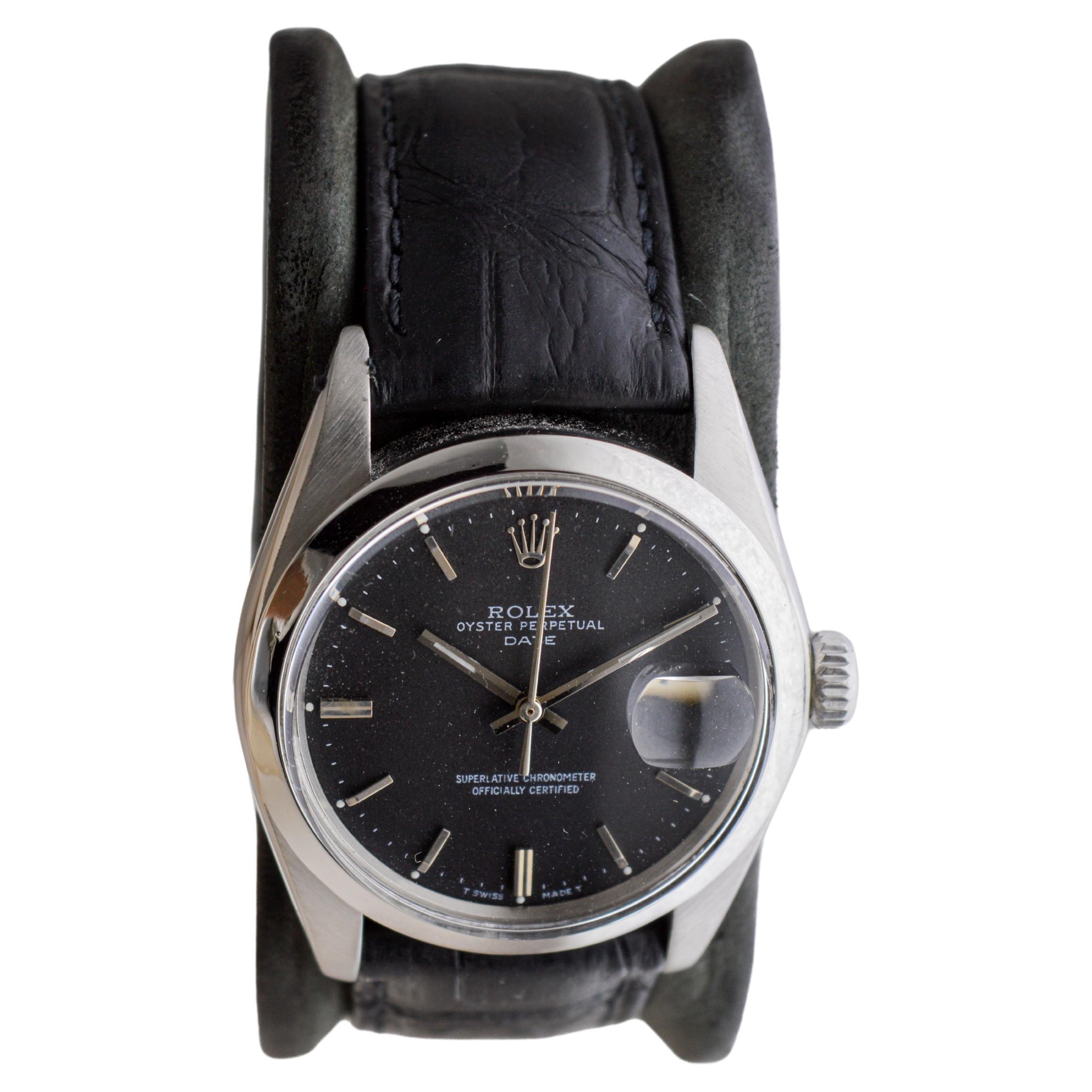 Rolex Steel Oyster Perpetual Date with Rare Flawless Black Dial circa, 1970's In Excellent Condition For Sale In Long Beach, CA