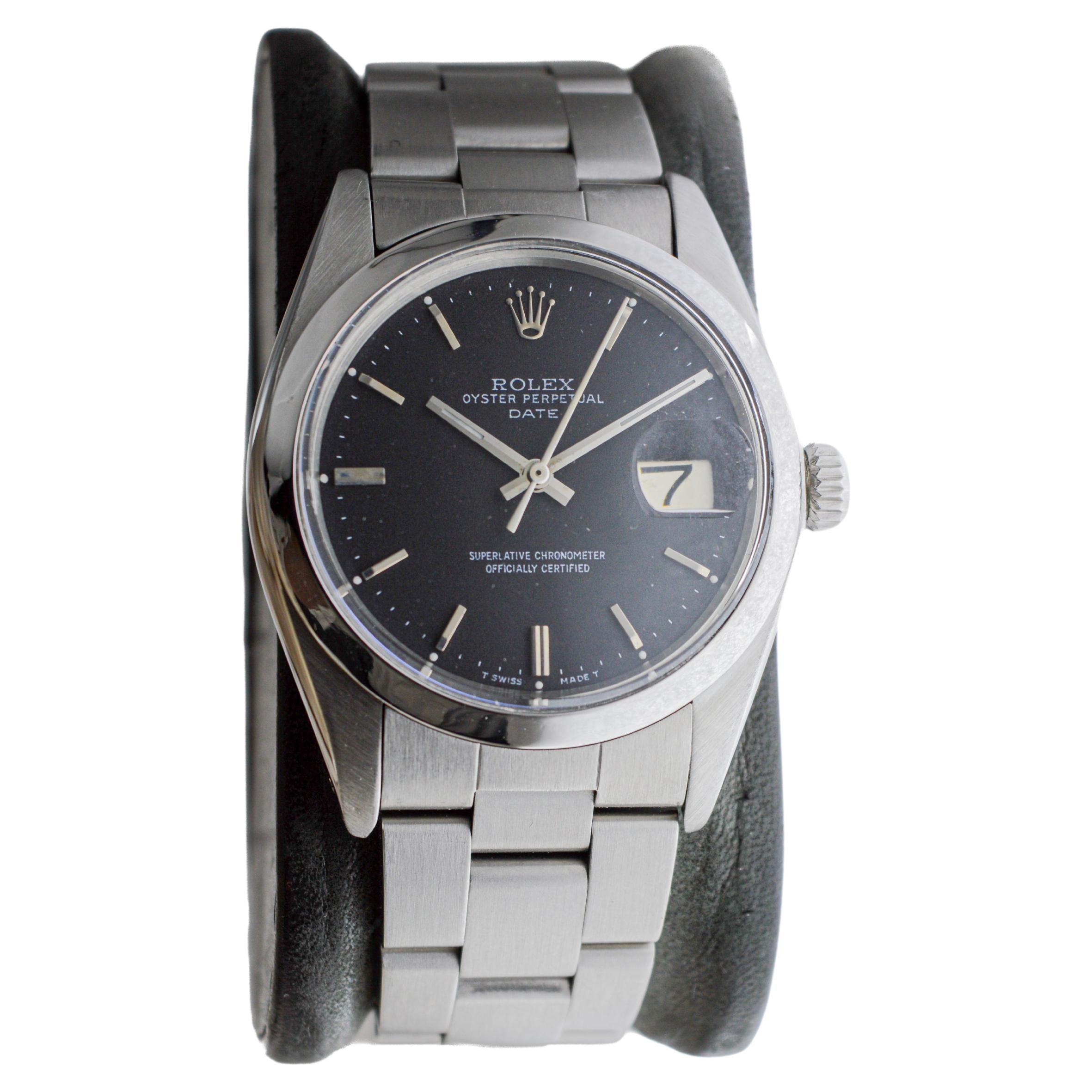 Rolex Steel Oyster Perpetual Date with Rare Flawless Black Dial circa, 1970's For Sale