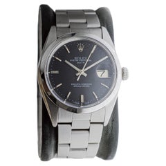Vintage Rolex Steel Oyster Perpetual Date with Rare Flawless Black Dial circa, 1970's