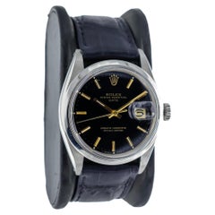 Rolex Steel Oyster Perpetual Date with Rare Original Black Dial and Gilt Markers