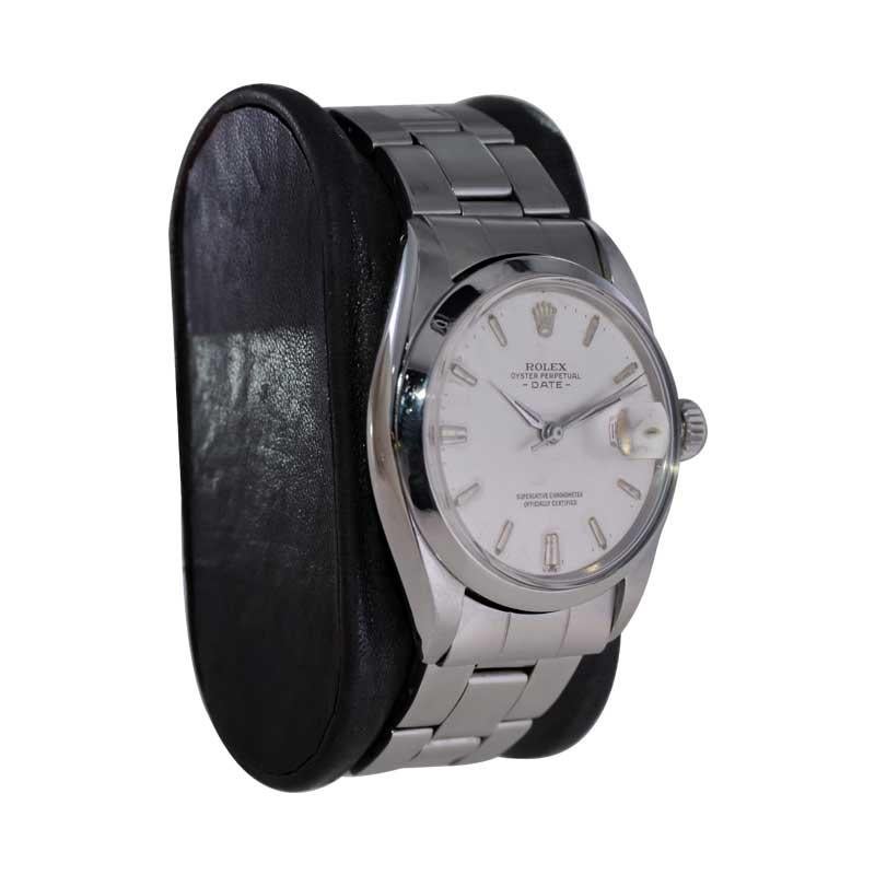 FACTORY / HOUSE: Rolex Watch Company
STYLE / REFERENCE: Oyster Perpetual Date / Reference 1500
METAL / MATERIAL: Stainless Steel
CIRCA / YEAR: 1960's
DIMENSIONS / SIZE: Length 34mm X Diameter 41mm
MOVEMENT / CALIBER: Perpetual Winding / 26 Jewels /