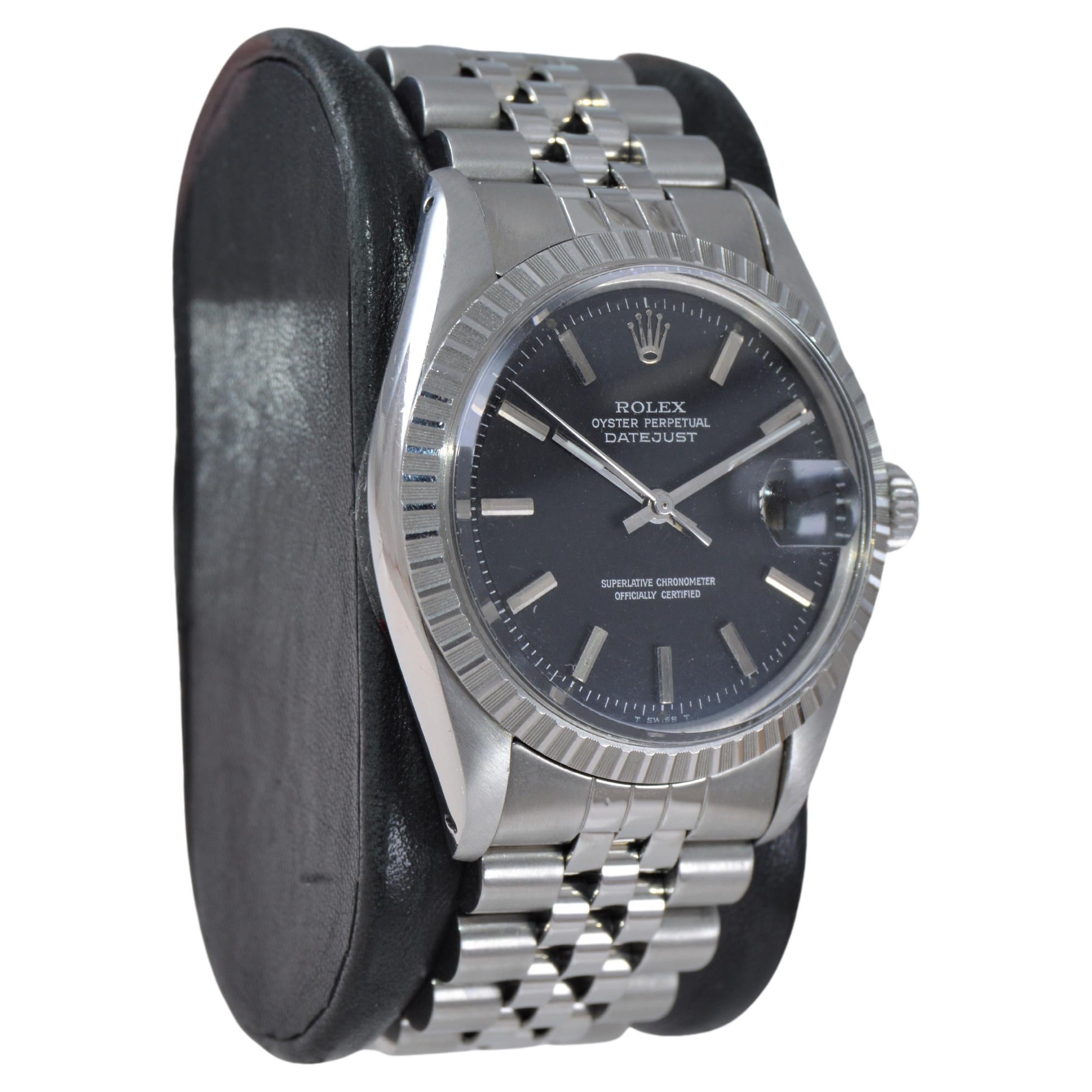 FACTORY / HOUSE: Rolex Watch Company
STYLE / REFERENCE: Oyster Perpetual Datejust / Reference 1601
METAL / MATERIAL: Stainless Steel
CIRCA / YEAR: 1970's
DIMENSIONS / SIZE: Length 41mm x Diameter 36mm
MOVEMENT / CALIBER: Perpetual Winding / 26