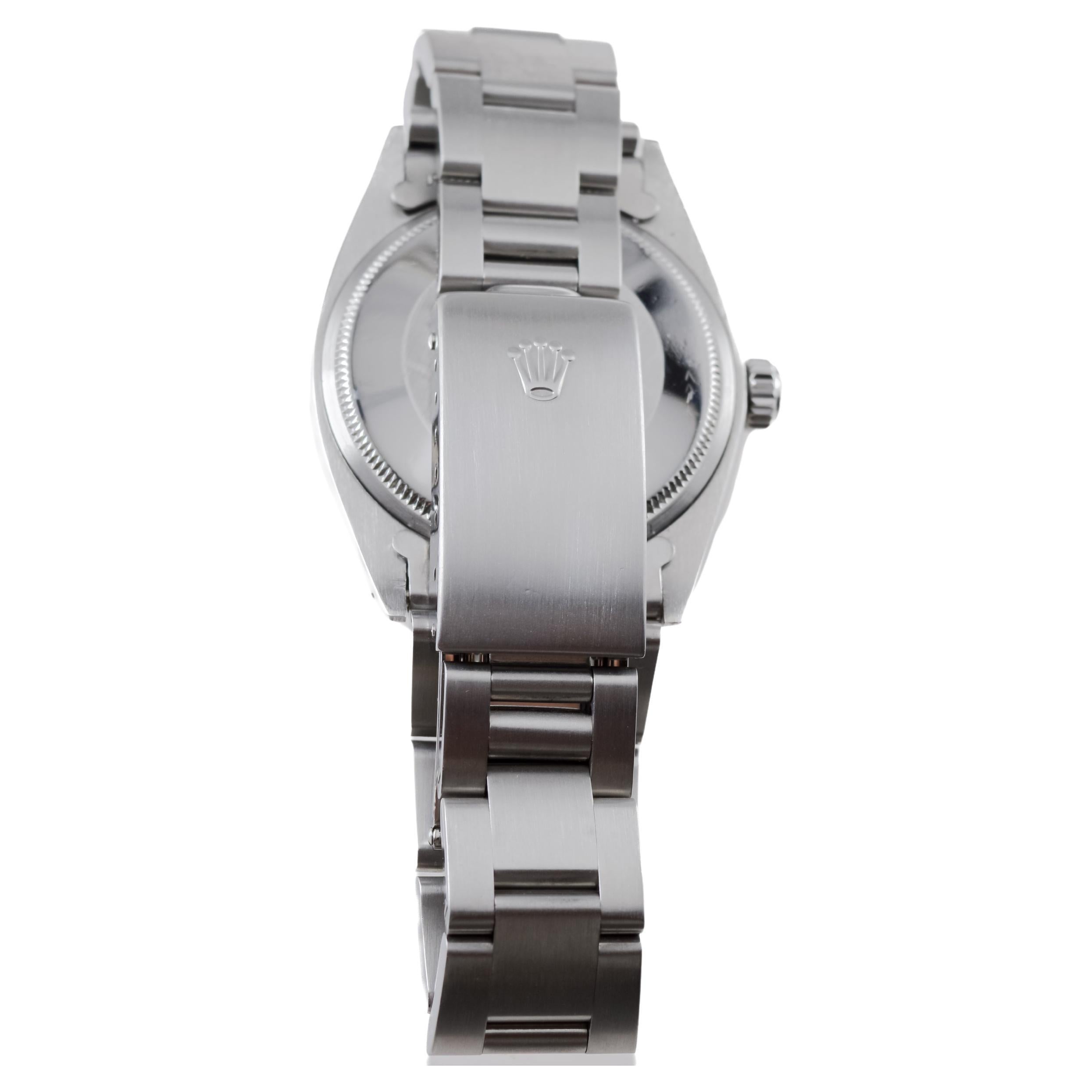 Rolex Steel Oyster Perpetual Datejust avec rare cadran noir circa, 1960's en vente 9