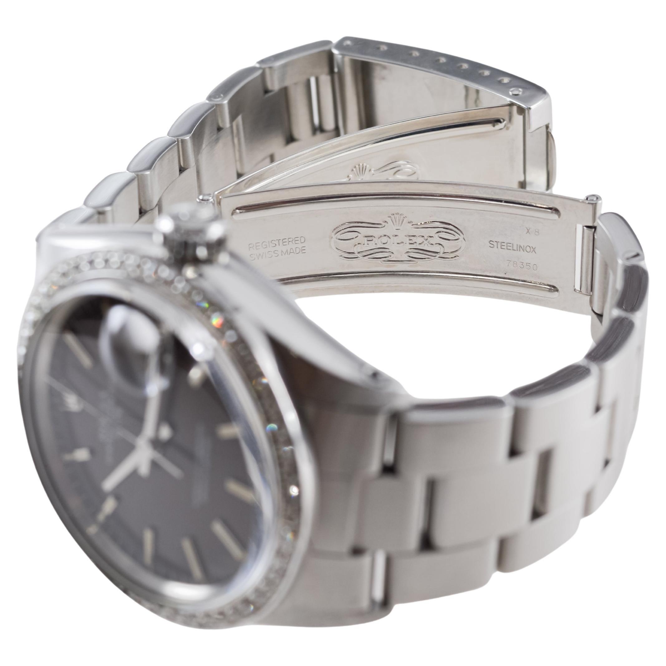 Rolex Steel Oyster Perpetual Datejust avec rare cadran noir circa, 1960's en vente 10