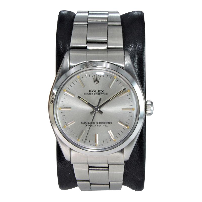 FACTORY / HOUSE: Rolex Watch Co.
STYLE / REFERENCE: Oyster Perpetual / Ref. 1002
METAL / MATERIAL: Stainless Steel
CIRCA / YEAR: Mid 1980's
DIMENSIONS / SIZE: 40mm x 34mm
MOVEMENT / CALIBER: Perpetual Winding / Jewels / Cal.1570
DIAL / HANDS: