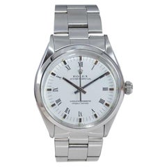 Rolex  Oyster Perpetual originale in acciaio con quadrante bianco con numeri romani, anni '70