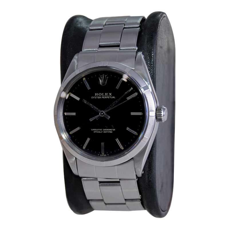 Rolex Steel Oyster Perpetual with Factory Original Rare Black Dial 1960's In Excellent Condition In Long Beach, CA