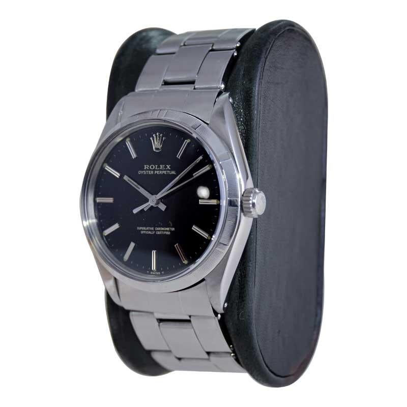 Women's or Men's Rolex Steel Oyster Perpetual with Factory Original Rare Black Dial 1960's