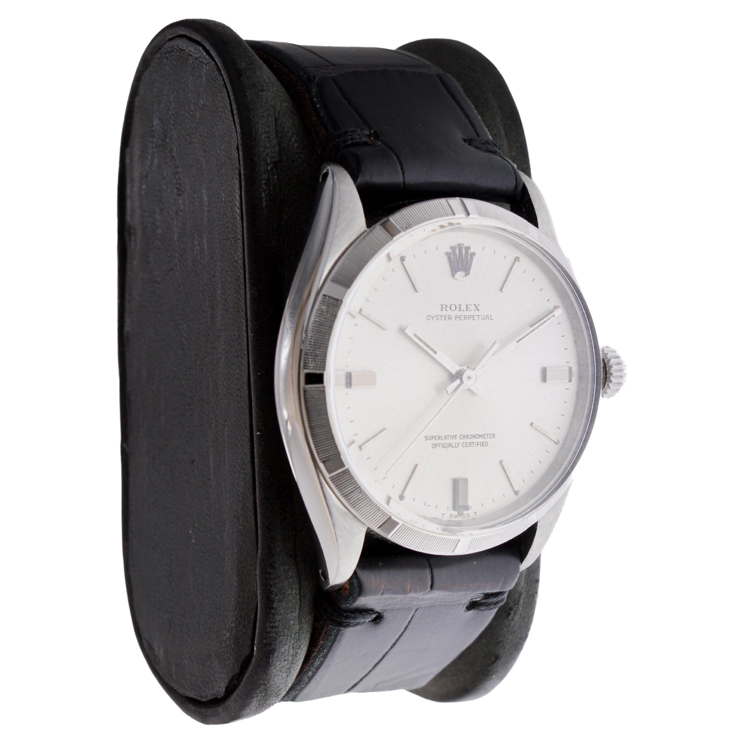 FACTORY / HOUSE: Rolex Watch Company
STYLE / REFERENCE: Oyster Perpetual / Reference 1003
METAL / MATERIAL: Stainless Steel 
CIRCA / YEAR: 1960's
DIMENSIONS / SIZE: Length 38mm X Diameter 35mm
MOVEMENT / CALIBER: Perpetual Winding / 26 Jewels /