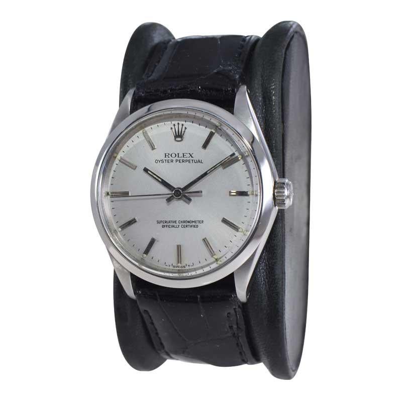 FACTORY / HOUSE: Rolex Watch Company
STYLE / REFERENCE: Oyster Perpetual  /  Reference 1002 
METAL / MATERIAL: Stainless Steel
CIRCA / YEAR: Mid 1960's
DIMENSIONS / SIZE: Length 39mm x Diameter 34mm
MOVEMENT / CALIBER: Perpetual Winding / 26 Jewels