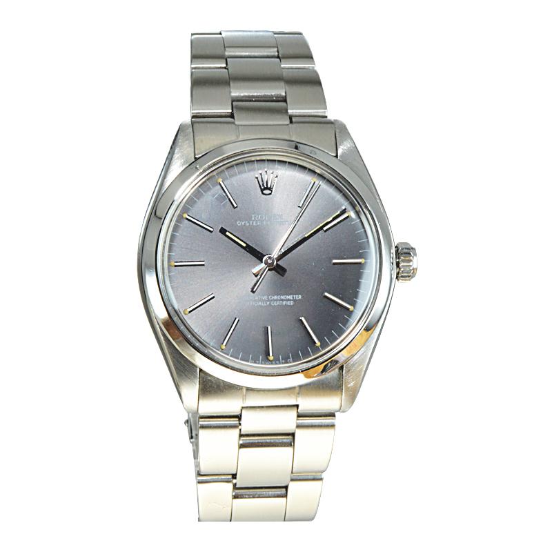 FACTORY / HOUSE: Rolex Watch Company
STYLE / REFERENCE: Round Oyster Perpetual / Ref. 1002
METAL / MATERIAL: Stainless Steel 
CIRCA / YEAR: Early 1960's
DIMENSIONS / SIZE: 40mm x 34mm
MOVEMENT / CALIBER: Manual Winding / 26Jewels 
DIAL / HANDS: