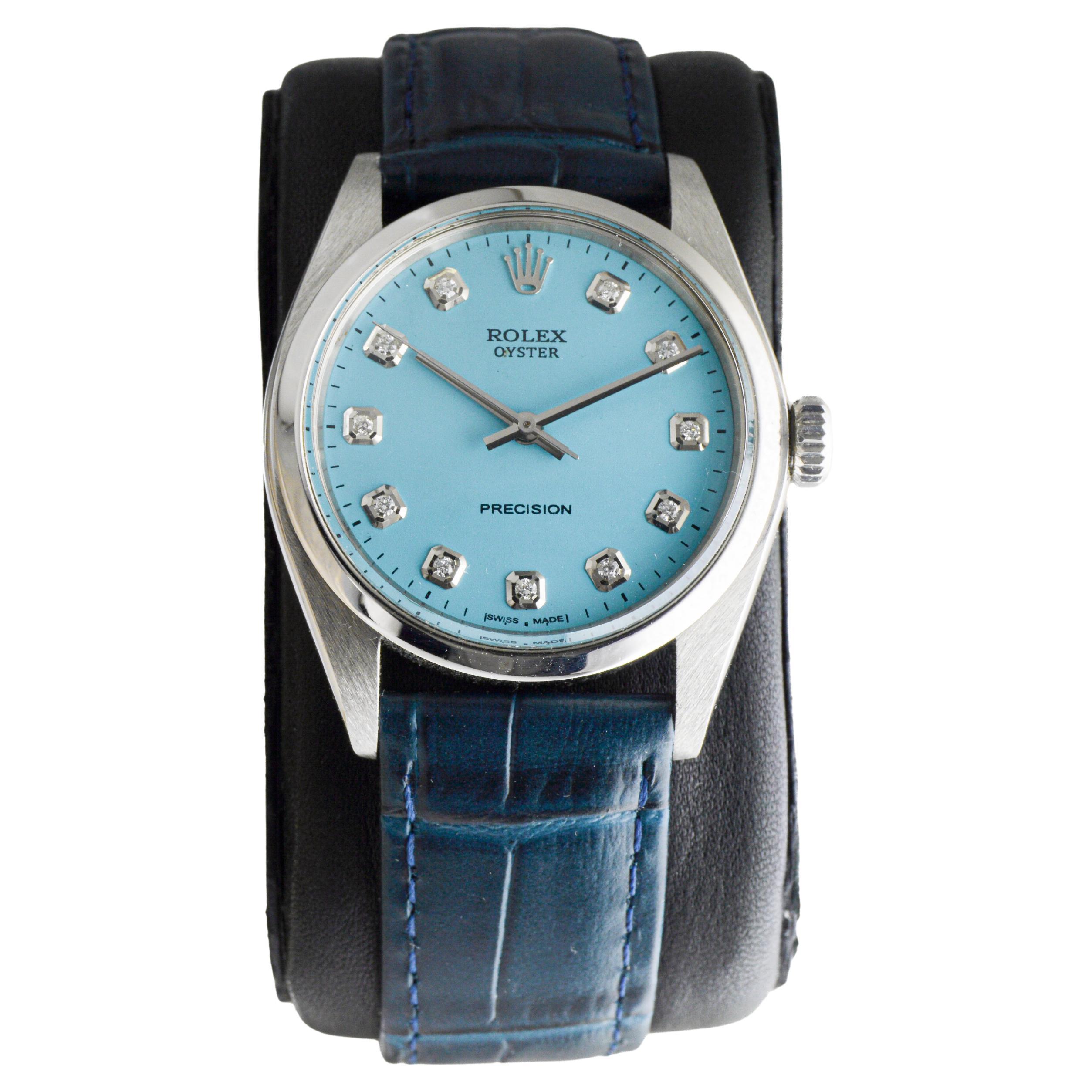 Femenino o masculino Rolex Oyster de acero con esfera azul hecha a medida y marcadores de diamantes baguette en venta