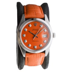 Rolex Oysterdate en acier avec cadran orange personnalisé et index en diamant circa, 1980's