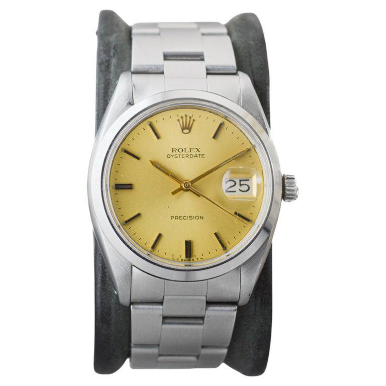 Women's or Men's Rolex Steel Oysterdate with Factory Original Champagne Dial circa, 1960's For Sale