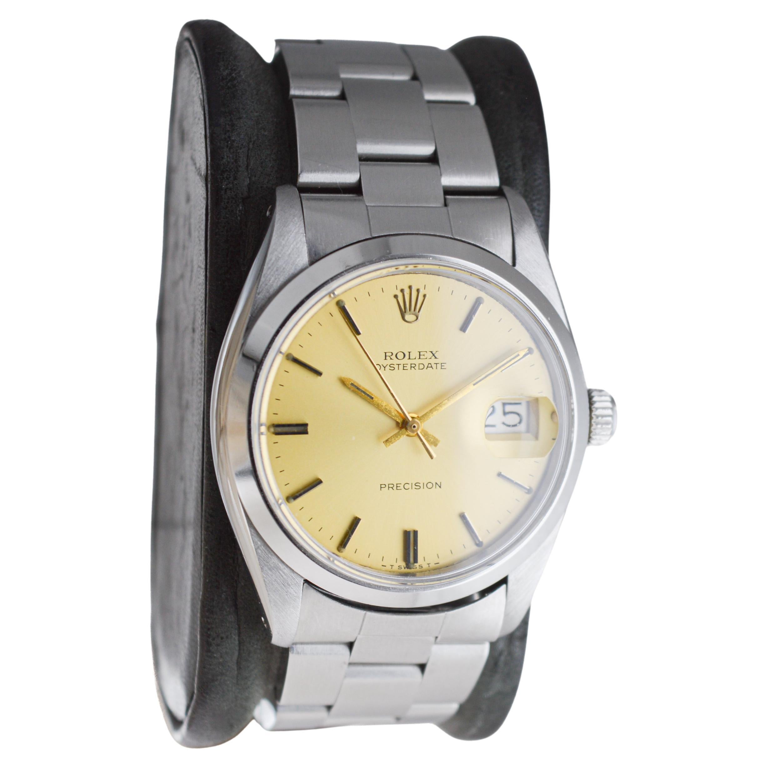 Rolex Steel Oysterdate with Factory Original Champagne Dial circa, 1960's In Excellent Condition For Sale In Long Beach, CA