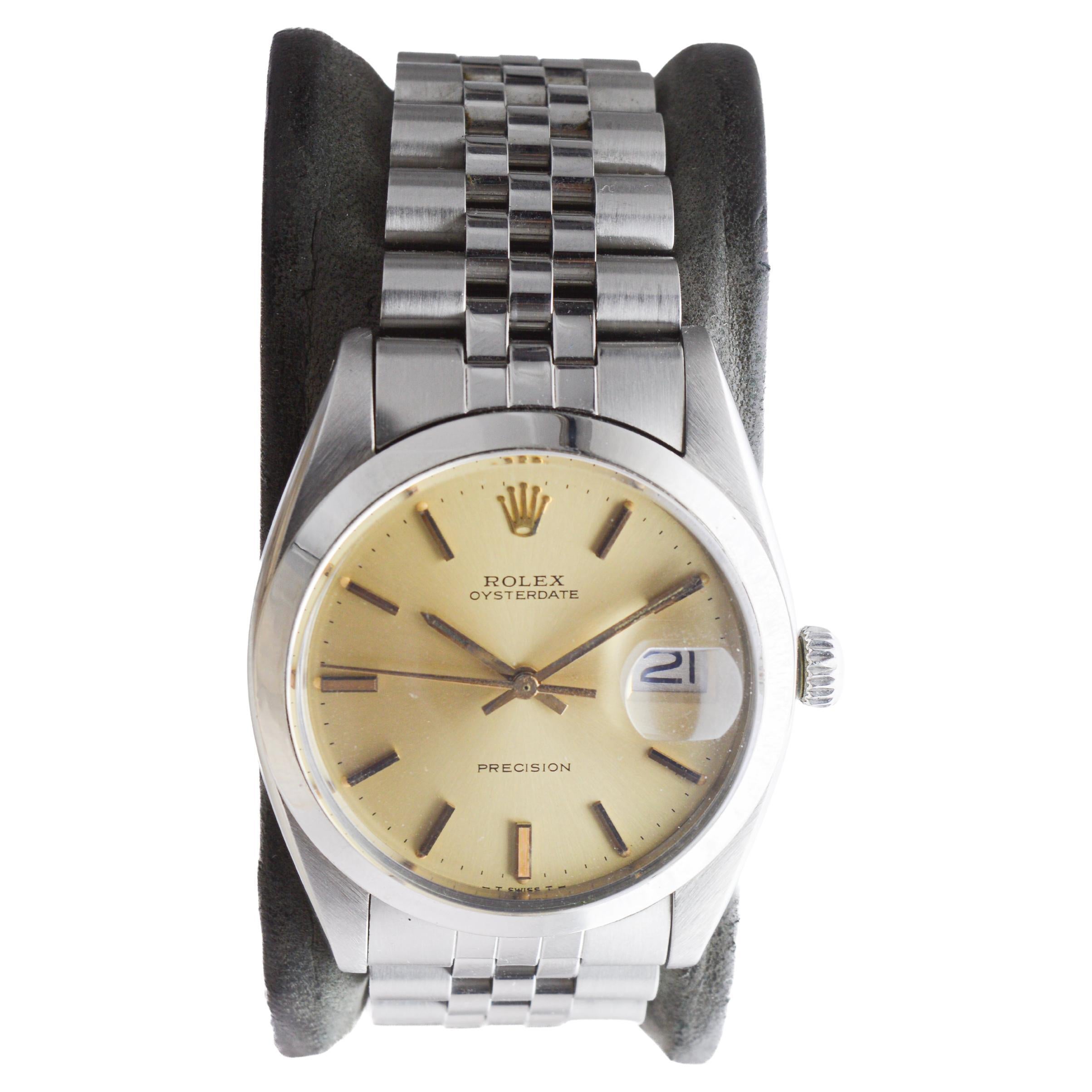 Rolex Steel Oysterdate with Factory Original Champagne Dial circa, 1960's In Excellent Condition For Sale In Long Beach, CA