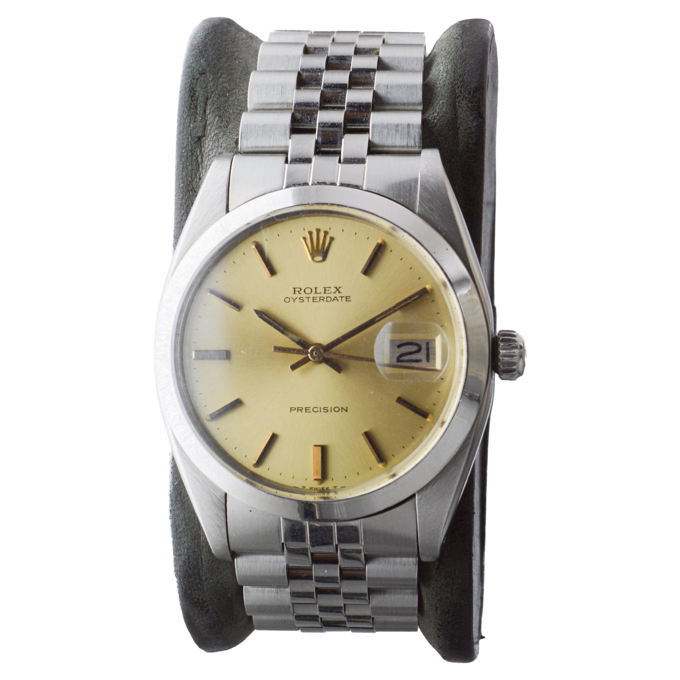 Women's or Men's Rolex Steel Oysterdate with Factory Original Champagne Dial circa, 1960's For Sale