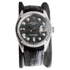 Rolex Steel Perpetual Date With Custom Mother of Pearl Dial and Custom Bezel