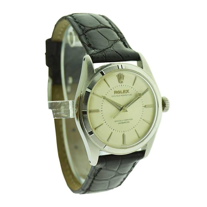 FACTORY / HOUSE: Rolex Watch Company
STYLE / REFERENCE: Oyster Perpetual / Ref. 6107
METAL / MATERIAL: Stainless Steel
CIRCA / YEAR: 1951 / 1952
DIMENSIONS / SIZE: 40mm X 35mm
MOVEMENT / CALIBER: Perpetual Winding / 18 Jewels / Cal. 645
DIAL /