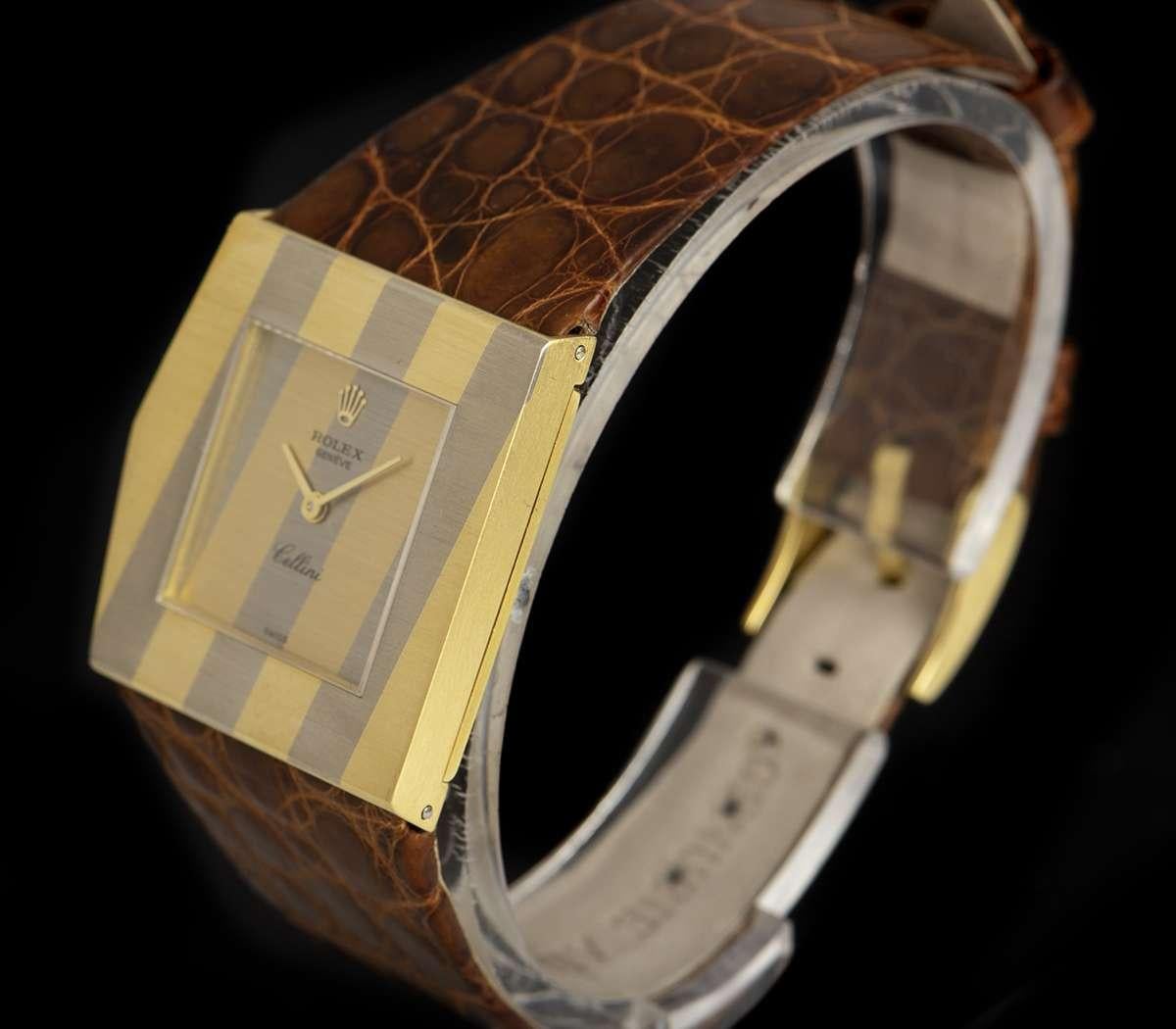 A Rare 18k Yellow Gold and 18k White Gold Striped Pentagonal King Midas Cellini Left-Handed Vintage Gents Wristwatch, yellow and white gold striped dial, a fixed 18k yellow gold and 18k white gold striped bezel, an original brown leather strap with