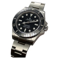 Rolex Submariner 124060 41mm Schwarz Keramik Edelstahl Box Papier 2023