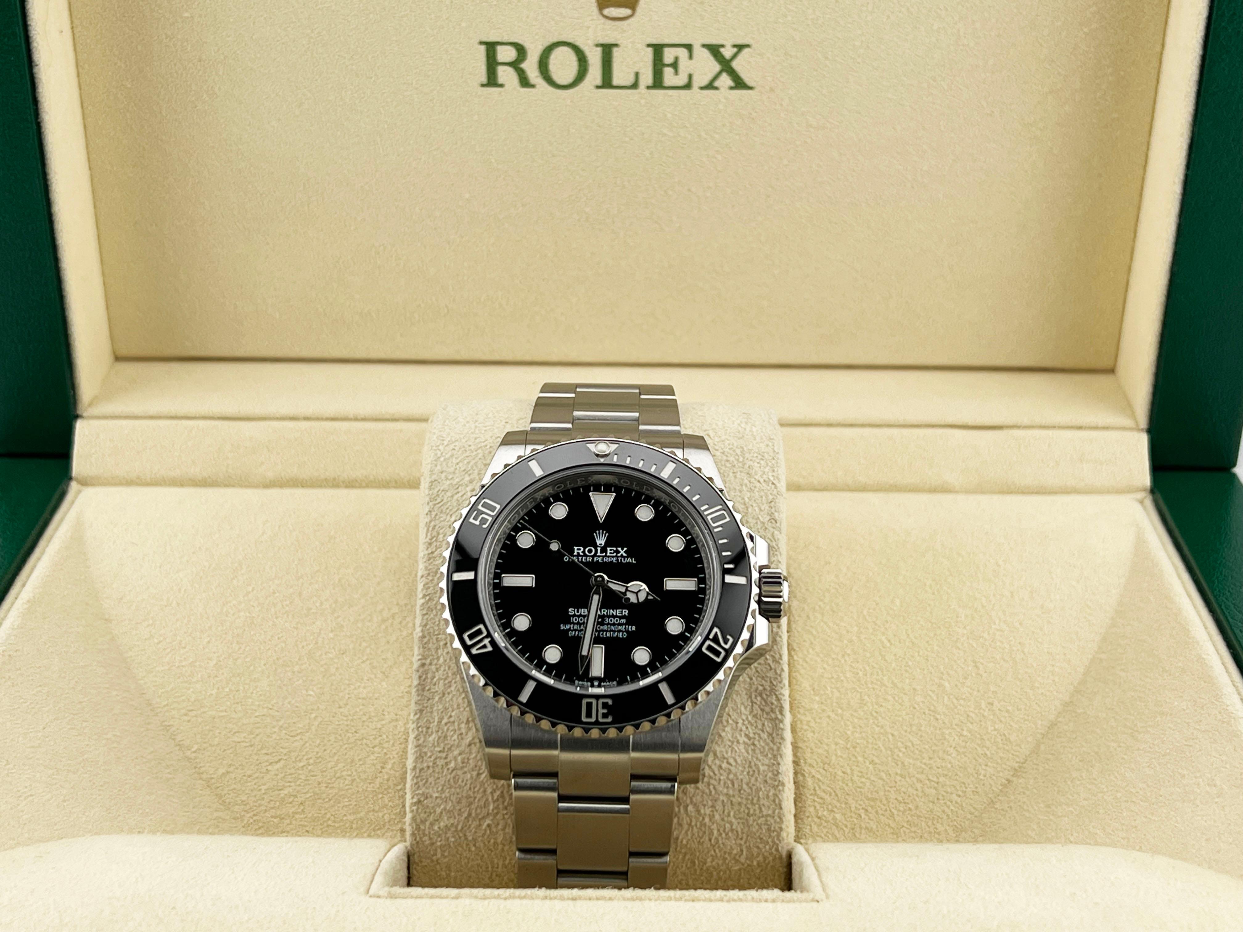 Style Number: 124060



Year: 2022

 

Model: Rolex Submariner (No Date)

 

Case Material: Stainless Steel

 

Band: Stainless Steel

   

Bezel: Black Ceramic

  

Dial: Black

 

Face: Sapphire Crystal

 

Case Size: 41mm

 

Includes: 

-Rolex