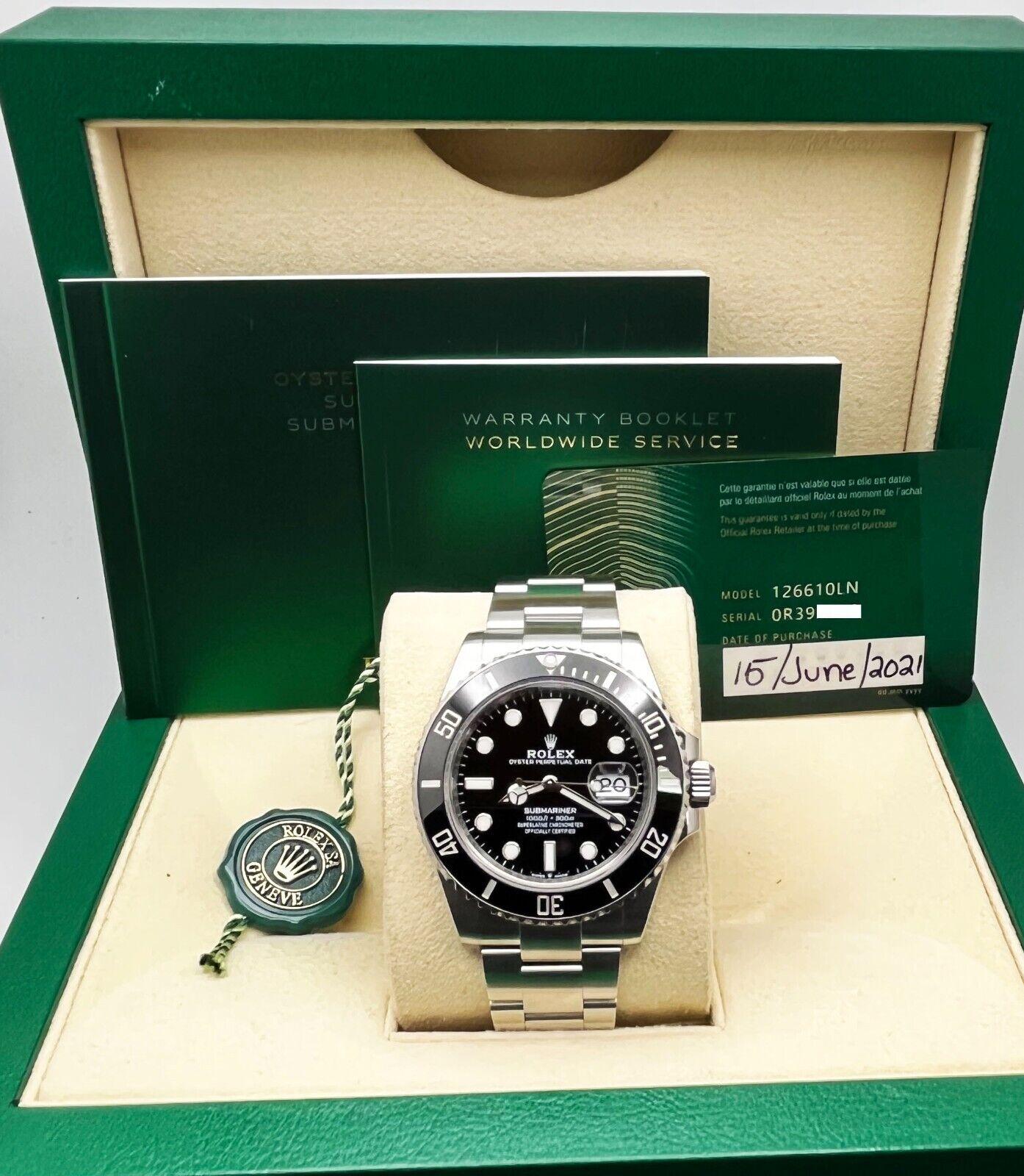 Style Number: 126610

Serial: 0R39X***

Year: 2021
 
Model: Submariner
 
Case Material: Ceramic
 
Band: Stainless Steel
 
Bezel: Stainless Steel
 
Dial: Black
 
Face: Sapphire Crystal
 
Case Size: 41mm
 
Includes: 
-Rolex Box & Papers
-Certified