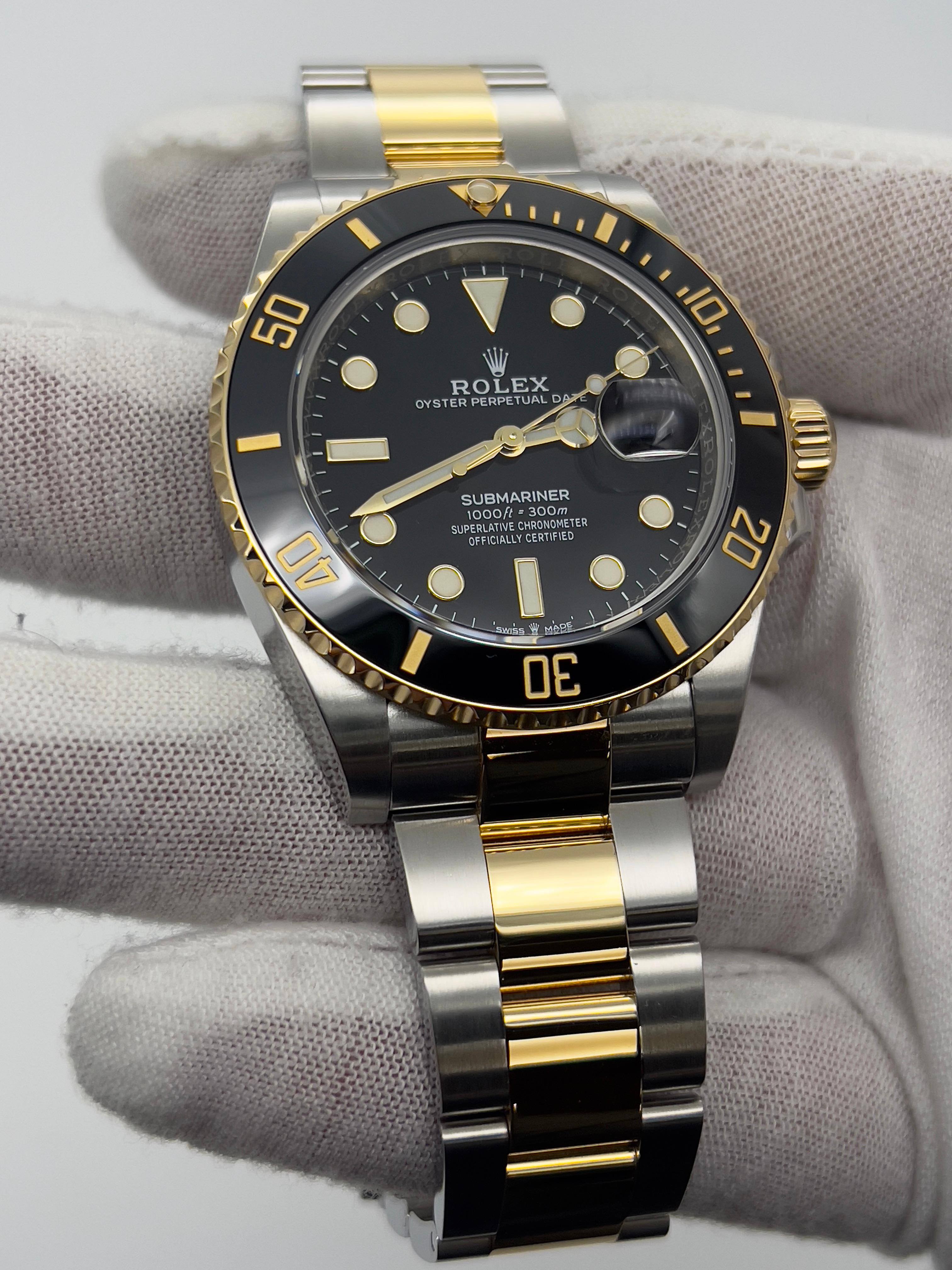 Style Number: 126613LN
Serial: 1S15T***
Year: 2020
Model: Submariner
Case Material: Stainless Steel
Band: 18K Yellow Gold & Stainless Steel
Bezel: Black Ceramic
Dial: Black
Face: Sapphire Crystal
Case Size: 41mm


Includes: 
-Rolex Box &