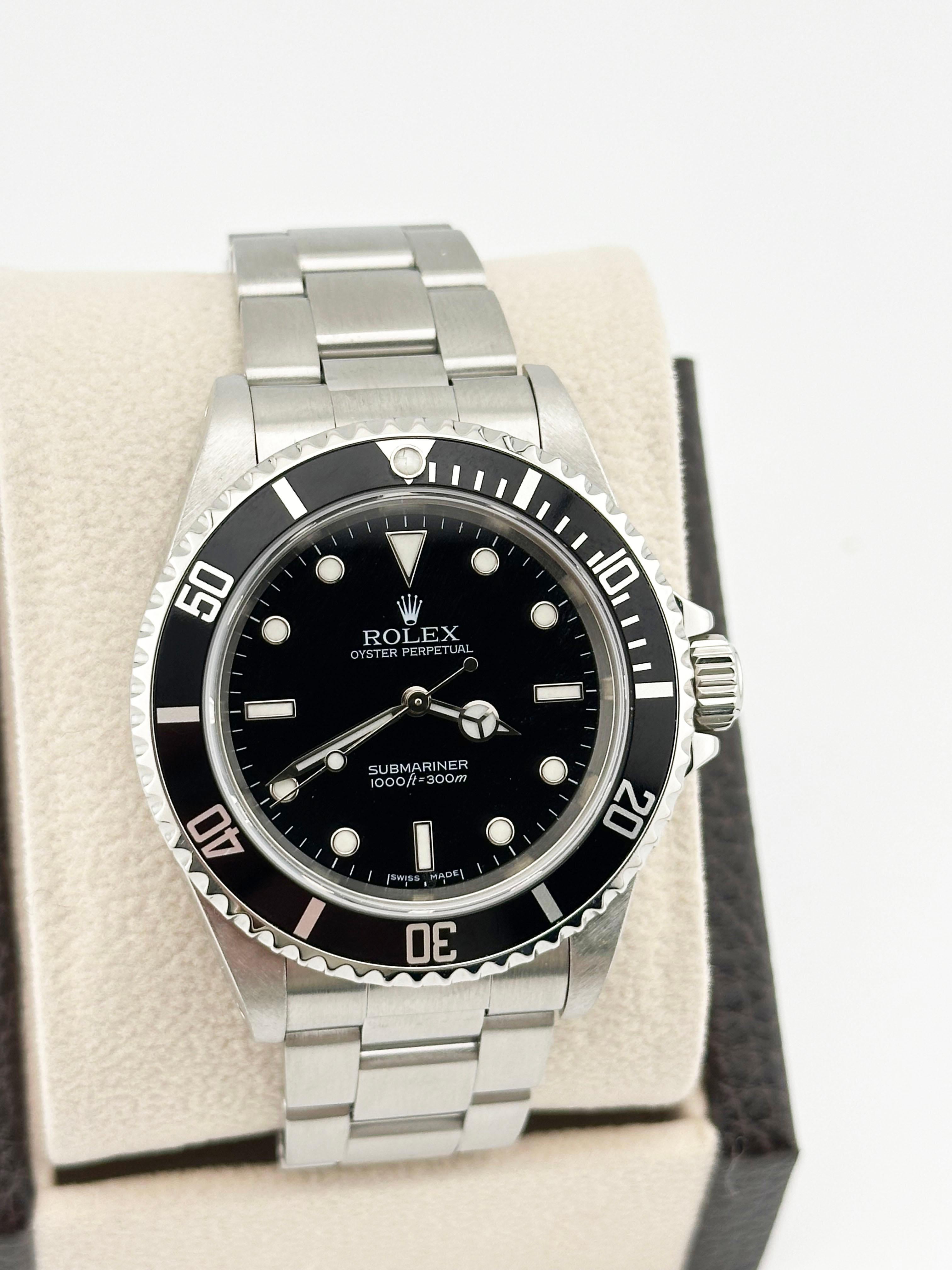 Style Number: 14060


Serial: Z529***


Year: 2006


Model: Rolex Submariner 


Case Material: Stainless Steel 


Band: Stainless Steel 

Bezel: Black Bezel 


Dial: Black Dial 


Face: Sapphire Crystal 


Case Size: 40mm 


Includes:

-Elegant