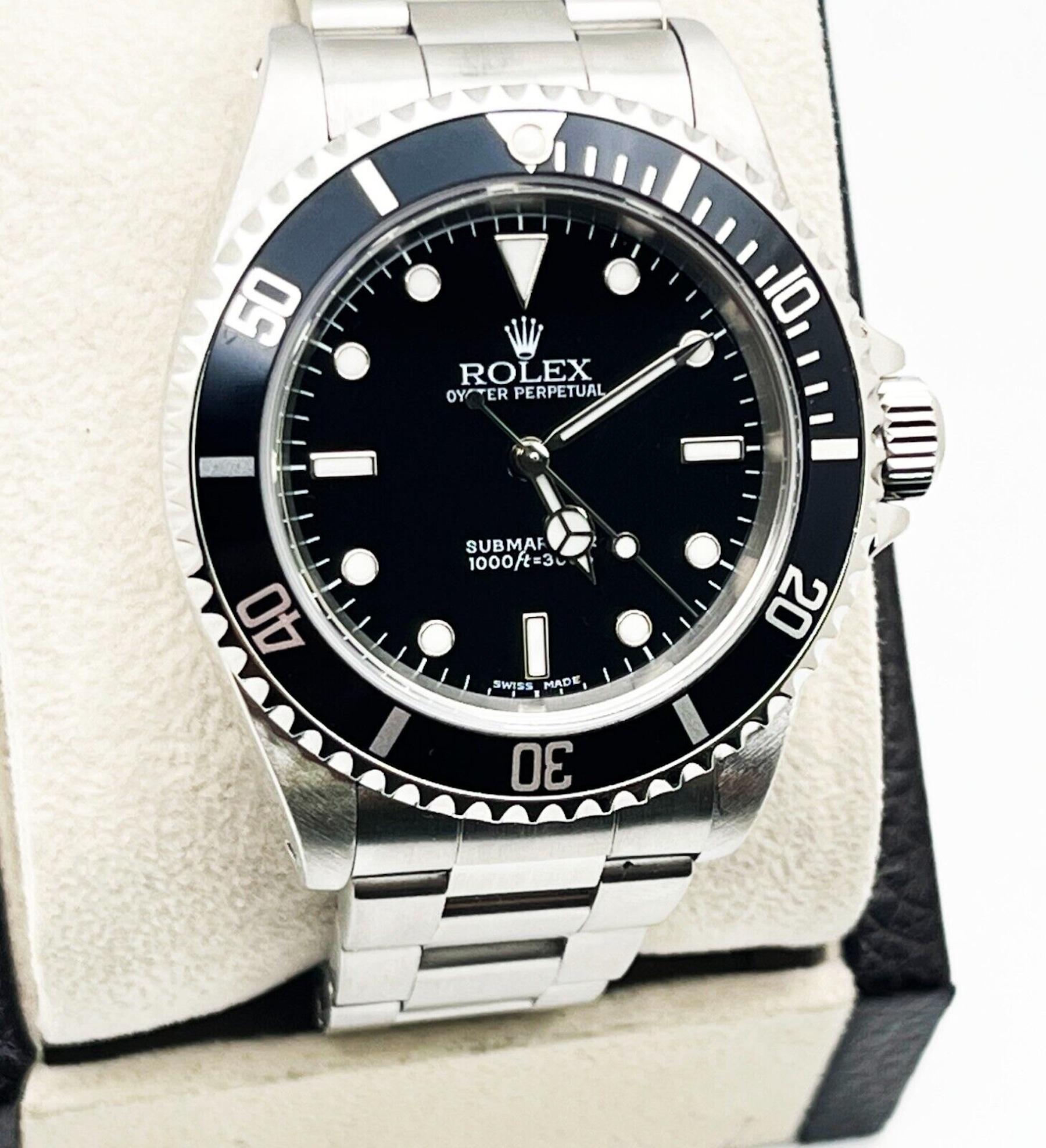 Women's or Men's Rolex Submariner 14060 Black Dial Stainless Steel Box Paper 2005 For Sale