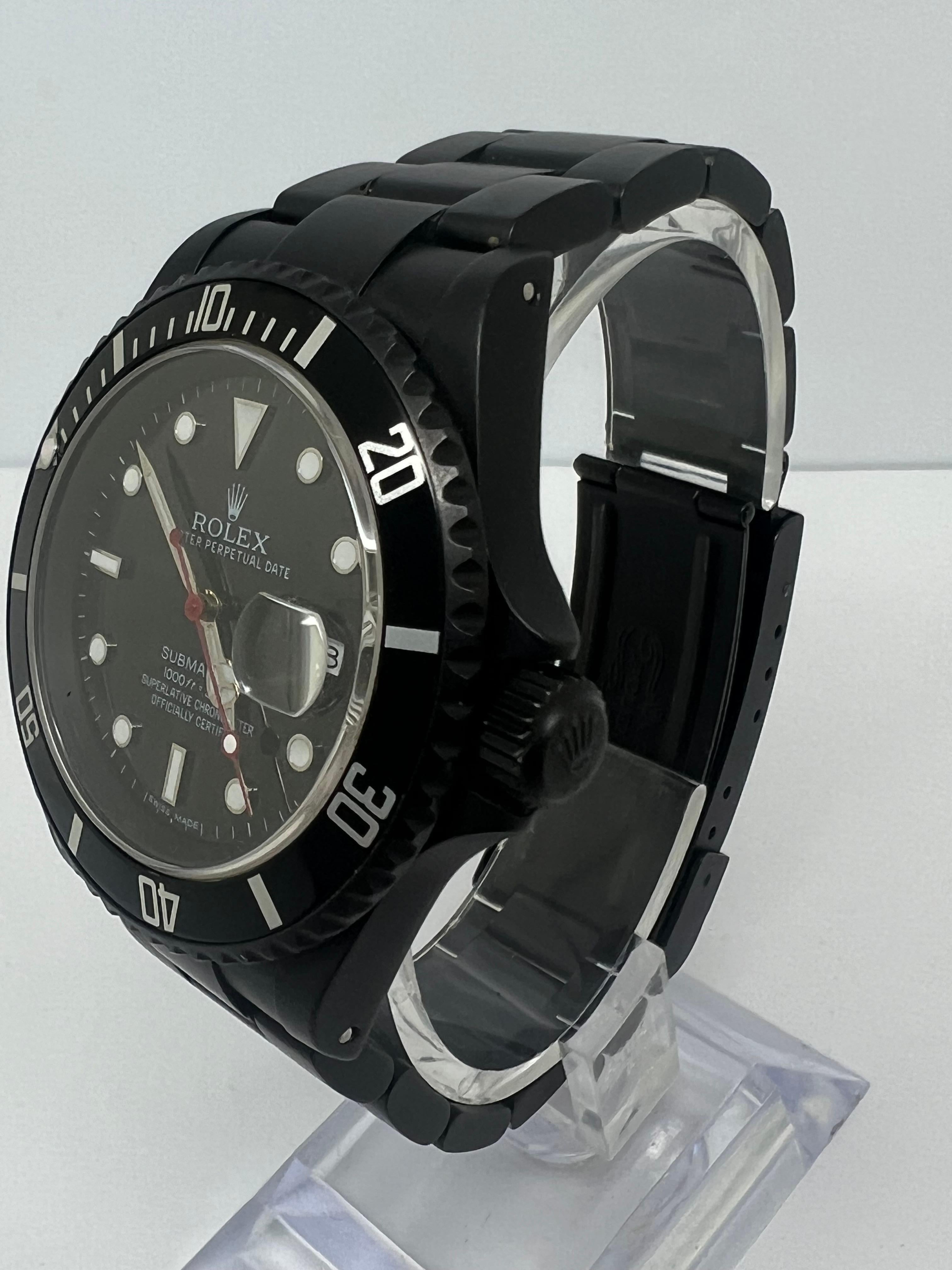 Rolex Submariner 16610 Carbon Blacked Out Watch

excellent condition

custom carbon black was added to steel

runs perfect

No box or papers

shop with confidence 

Evita diamonds