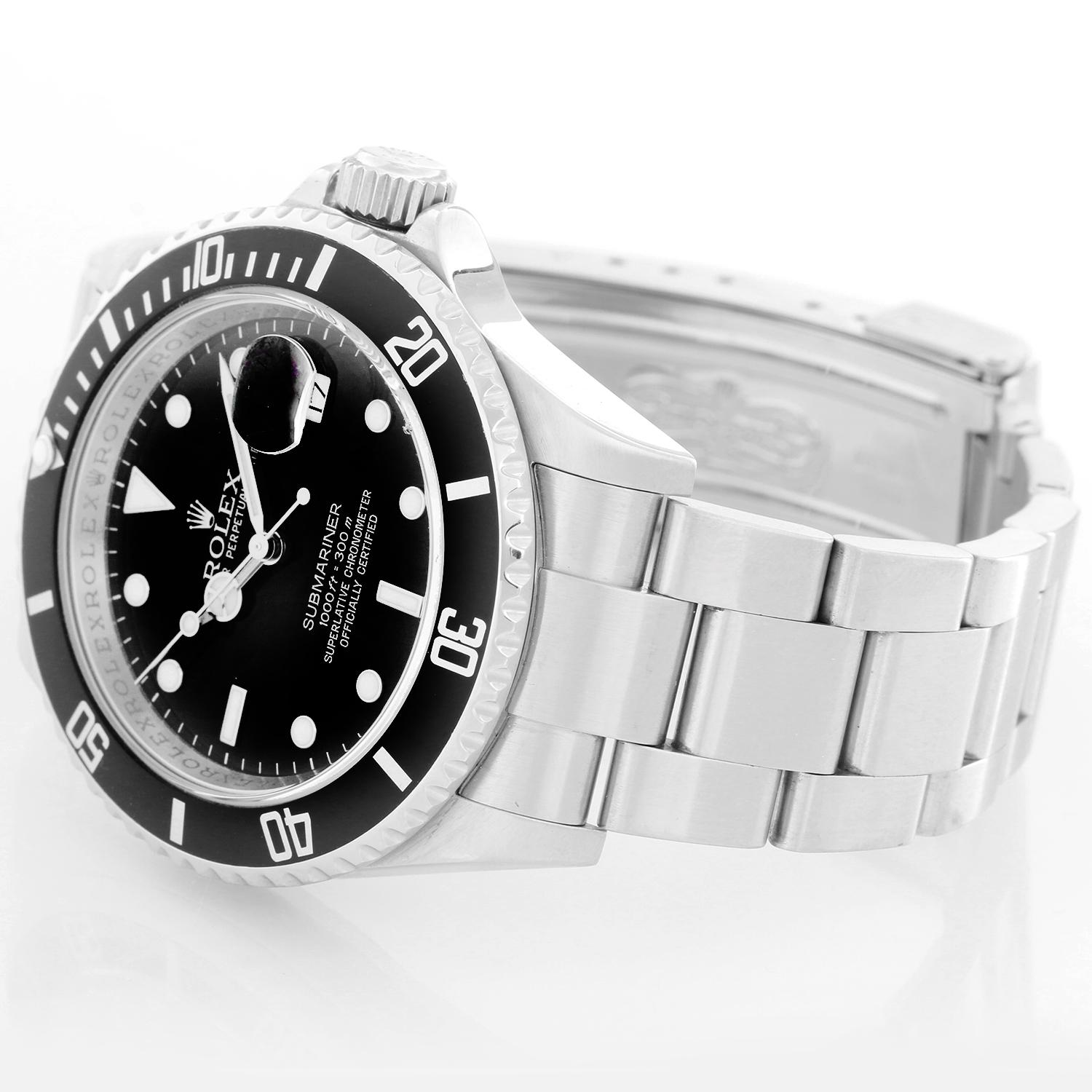 Rolex Submariner 16610 Stainless Steel Men's Watch - Automatic winding, 31 jewels, Quickset, sapphire crystal. Stainless steel case  . Black dial with luminous hour markers. Stainless steel Oyster bracelet with flip-lock clasp. Pre-owned with box