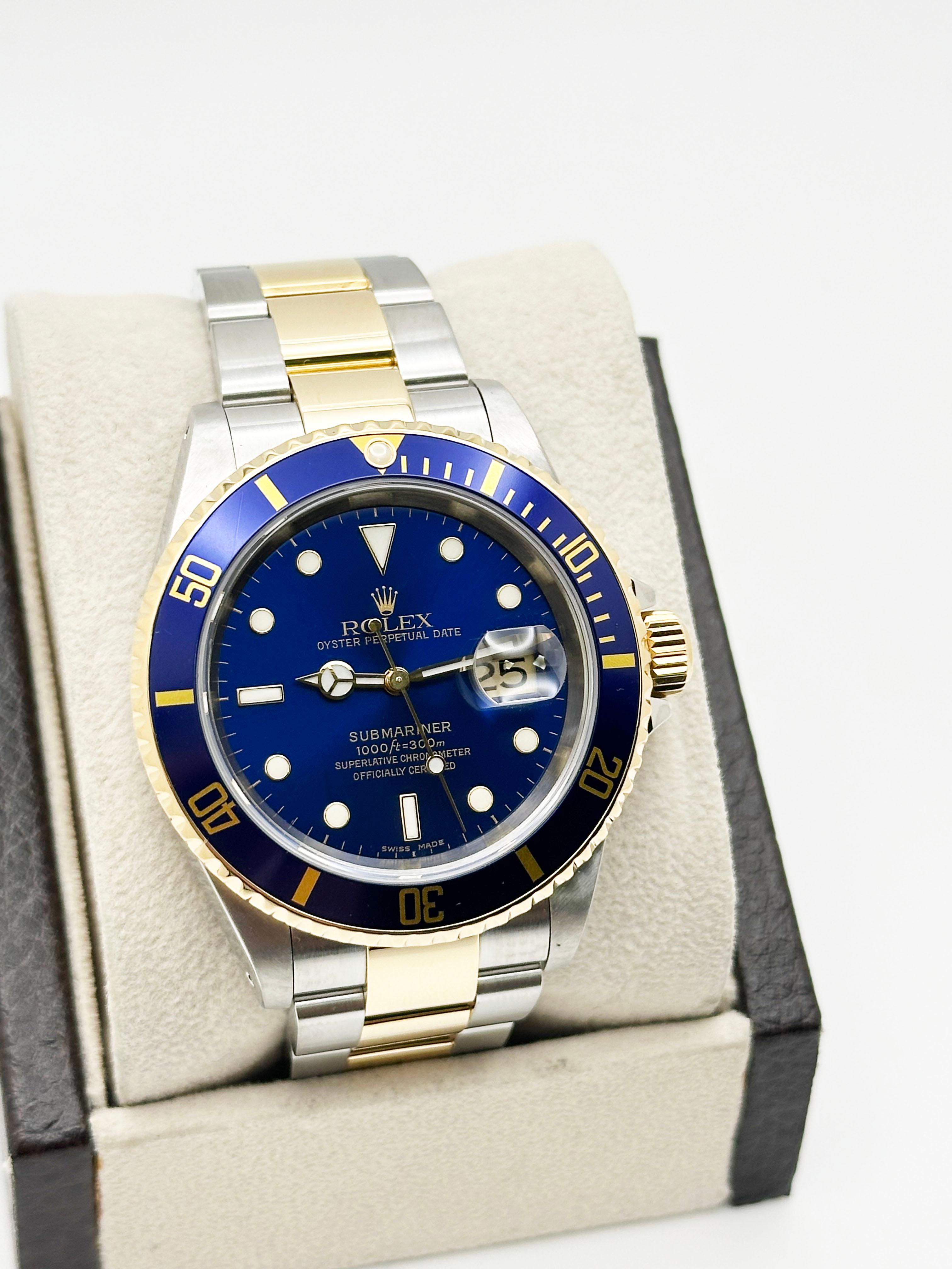 Numéro de style : 16613

Série : Y530***

Année : 2002
 
Modèle : Rolex Submariner 
 
Matériau du boîtier : Acier inoxydable 
 
Bande : or jaune 18K et acier inoxydable 
  
Lunette : Lunette bleue 
  
Cadran : Cadran bleu 
 
Visage : Cristal saphir
