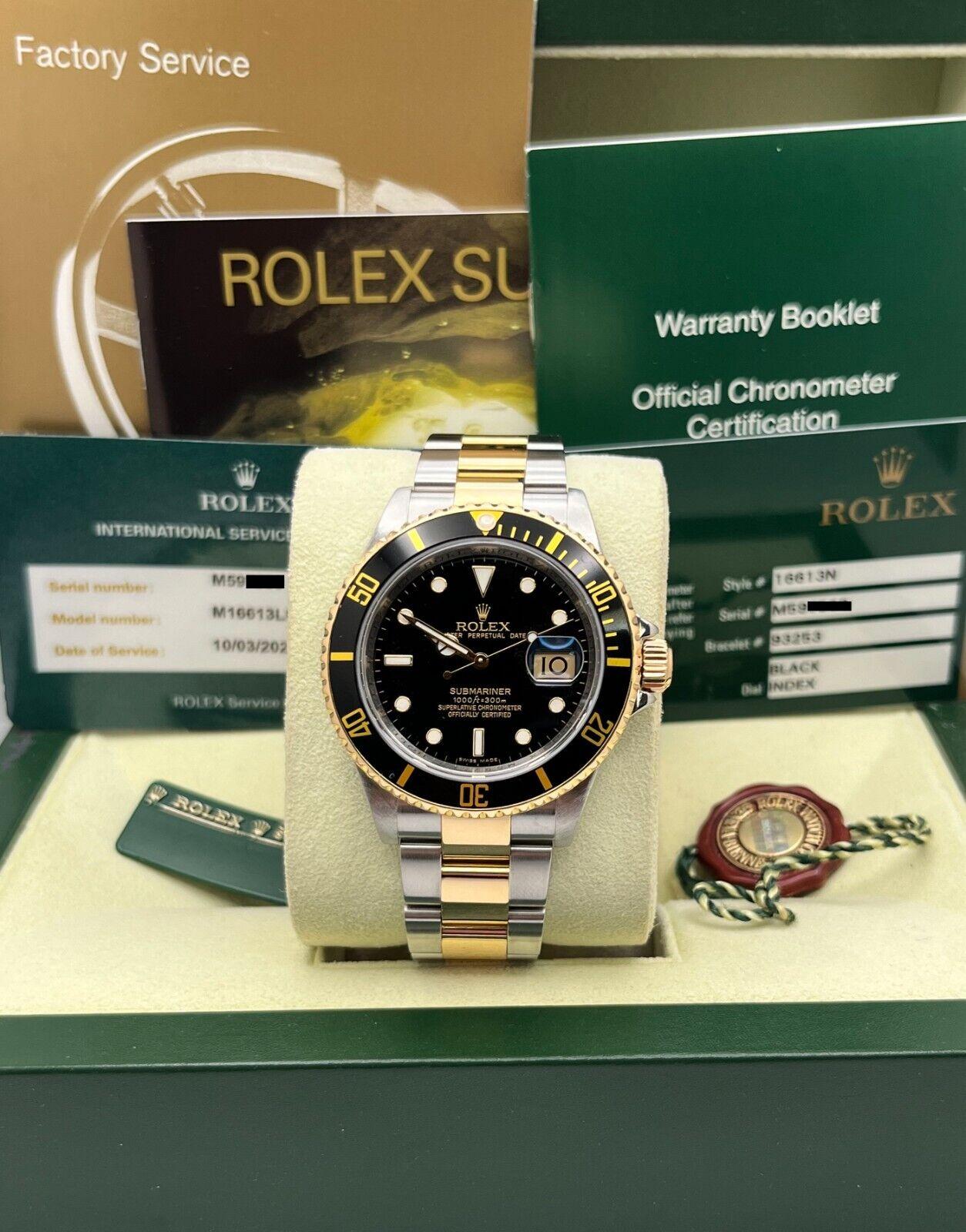 Rolex Submariner 16613 Schwarzes Zifferblatt 18K Gelbgold Stahl 2011 Rehaut Box Papier 1