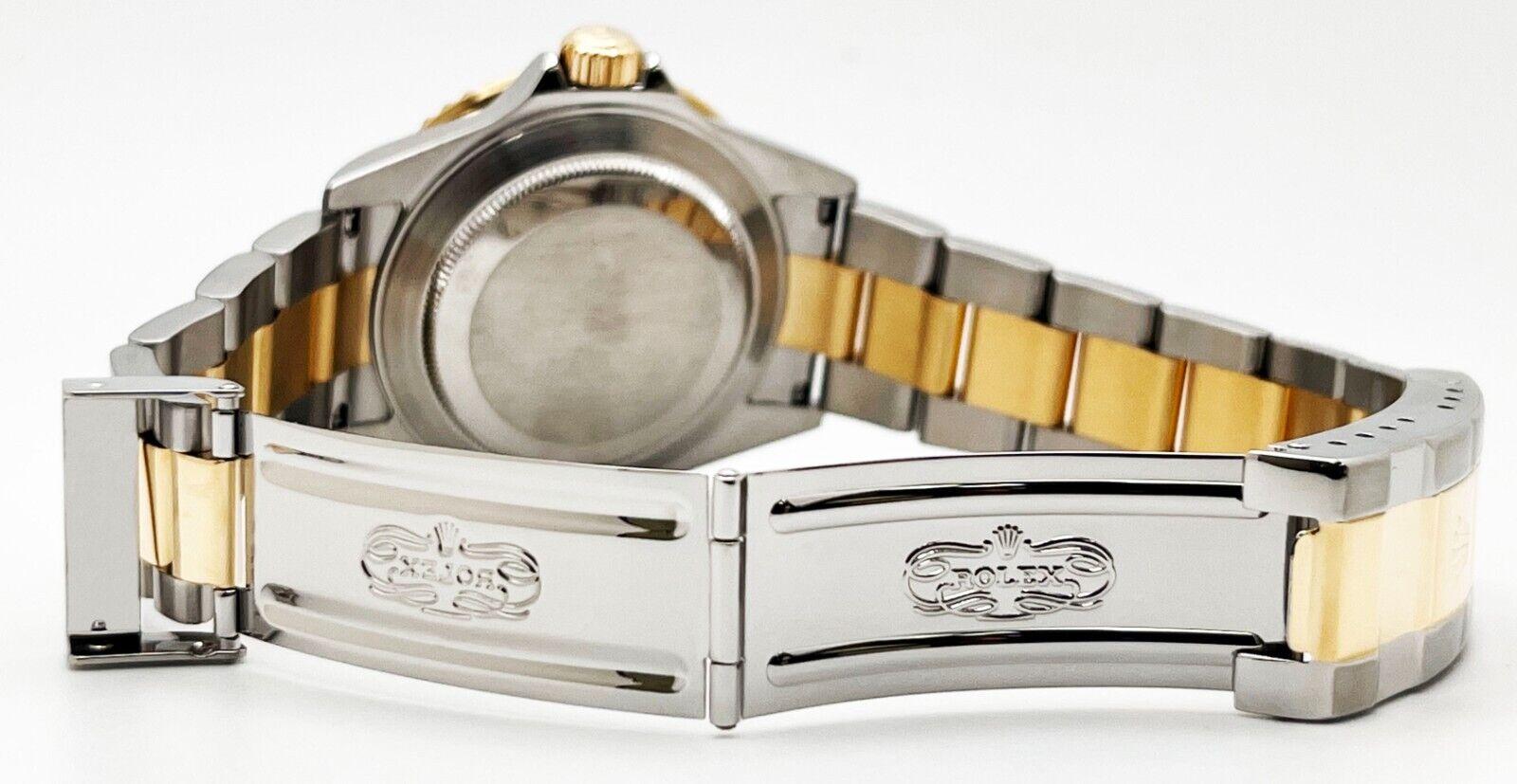 Rolex Submariner 16613 Schwarzes Zifferblatt 18K Gelbgold Stahl 2011 Rehaut Box Papier 2