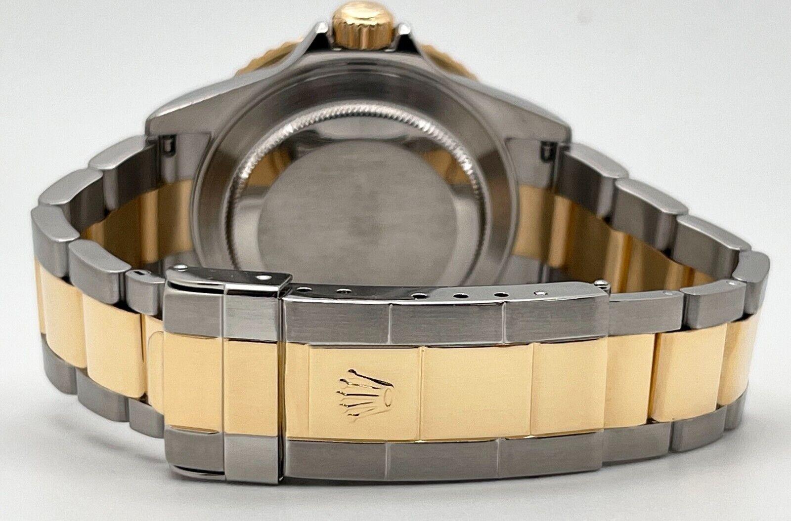 Rolex Submariner 16613 Schwarzes Zifferblatt 18K Gelbgold Stahl 2011 Rehaut Box Papier 3
