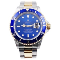 Used Rolex Submariner 16613 Blue Dial 18 Karat Yellow Gold Stainless Steel