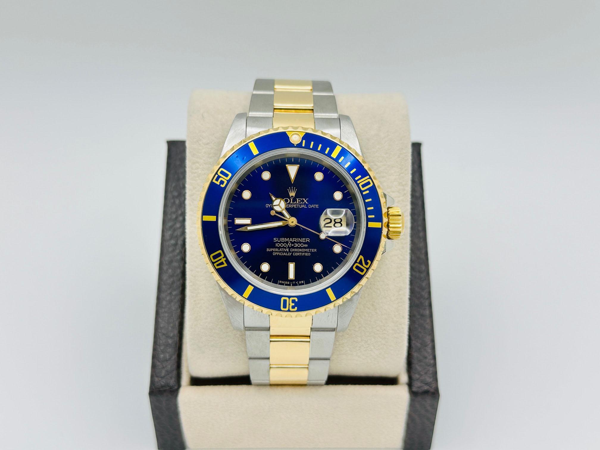 Número de estilo: 16613



De serie: S319***



Año: 1993

 

Model No: Rolex Submariner

 

Material de la caja: Acero inoxidable

 

Pulsera: Oro amarillo de 18 quilates y acero inoxidable

  

Bisel: Azul

  

Esfera: Azul

 

Cristal: Cristal de