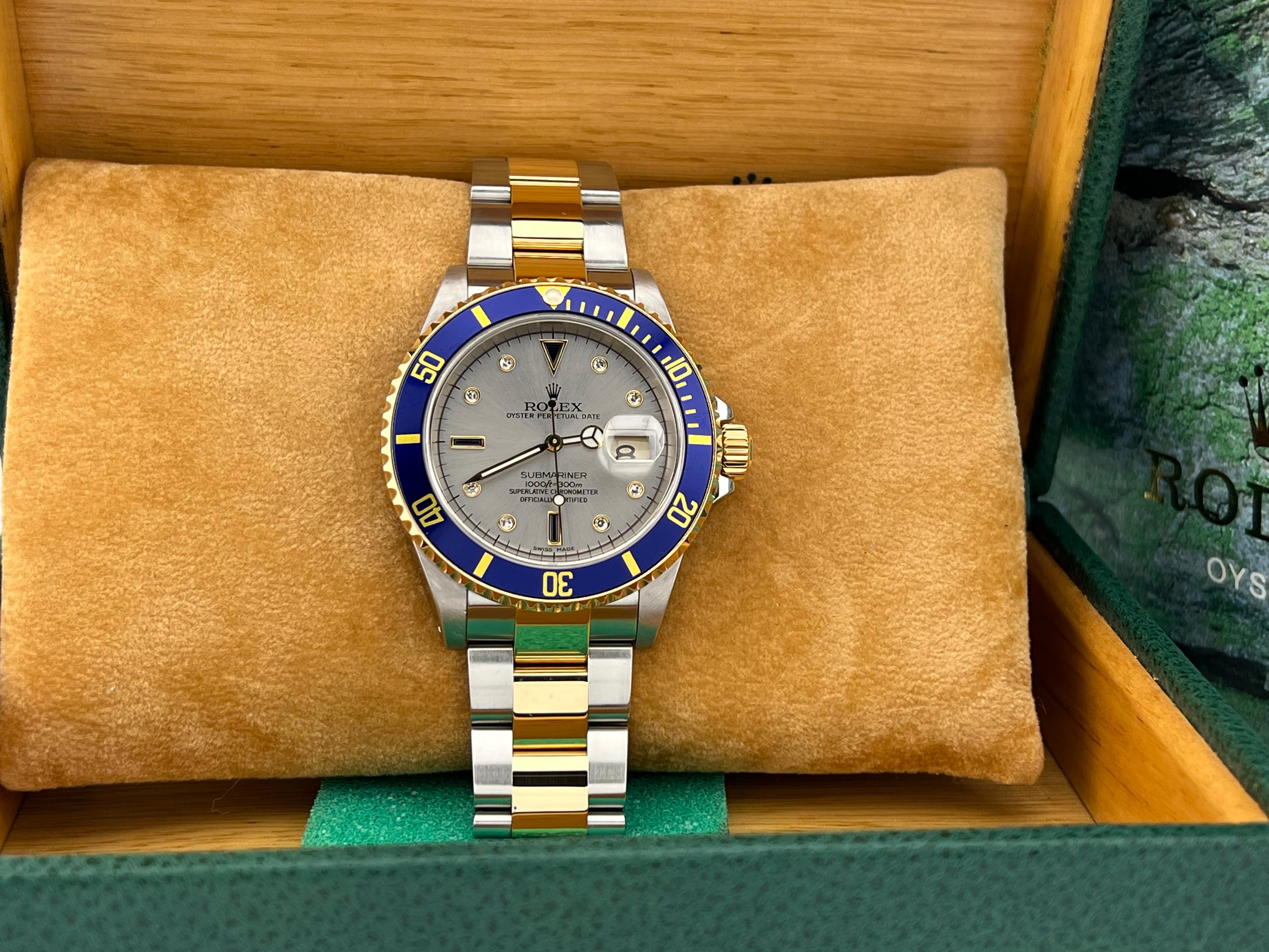 Style Number: 16613



Year: 2000

 

Model: Rolex Submariner 

 

Case Material: Stainless Steel 

 

Band: 18K Yellow Gold & Stainless Steel

  

Bezel: Blue Bezel 

  

Dial: Original Silver Serti Dial 

 

Face: Sapphire Crystal 

 

Case Size:
