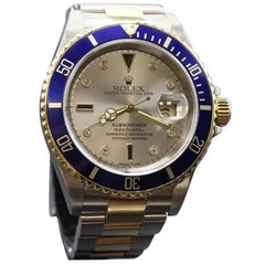 Used Rolex Submariner 16613 Silver Serti Diamond Dial 18 Karat Gold Stainless Steel