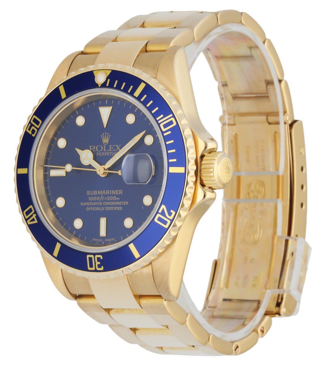 Rolex Submariner 16618 Men's Watch. 40mm 18K yellow gold case with 18K yellow gold unidirectional rotating bezel with blue bezel insert. Blue dial with luminous gold hands and dot hour markers. Date display at the 3 o'clock position. Minute markers