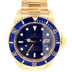 Rolex Submariner 16618 Oyster 18k Gelbgold Blau Sunburst Zifferblatt Herrenuhr