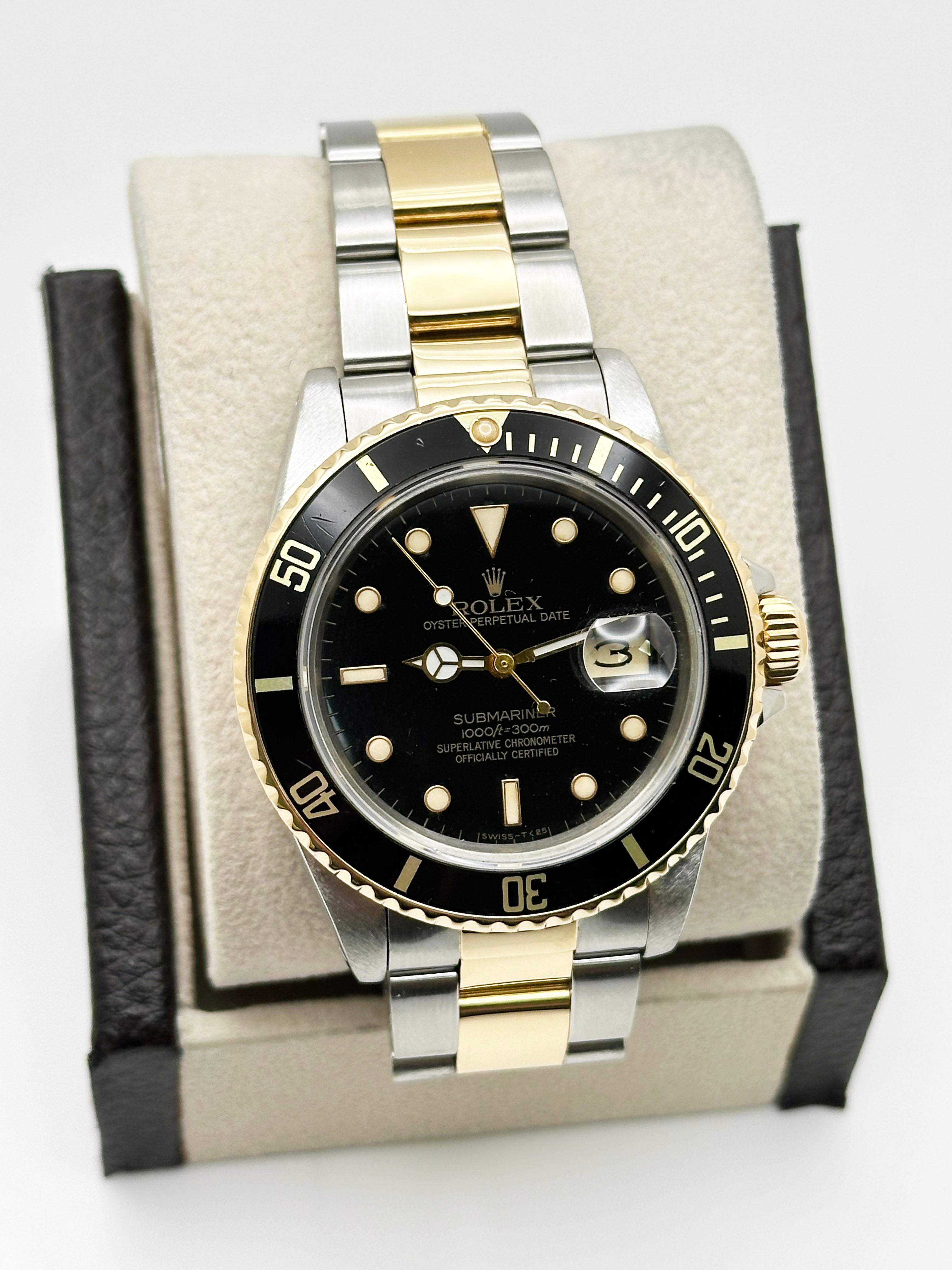 Style Number: 16803



Serial: 8434***



Year: 1984

 

Model: Rolex Submariner 

 

Case Material: Stainless Steel 

 

Band: 18K Yellow Gold & Stainless Steel 

  

Bezel: Black

  

Dial: Black Dial 

 

Face: Sapphire Crystal 

 

Case Size: