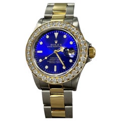 Rolex Submariner 16803 Quadrante blu Lunetta di diamanti Oro giallo 18 carati Acciaio inossidabile