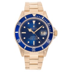 Montre automatique Rolex Submariner 16808 avec cadran bleu en or jaune 18 carats et cadran automatique