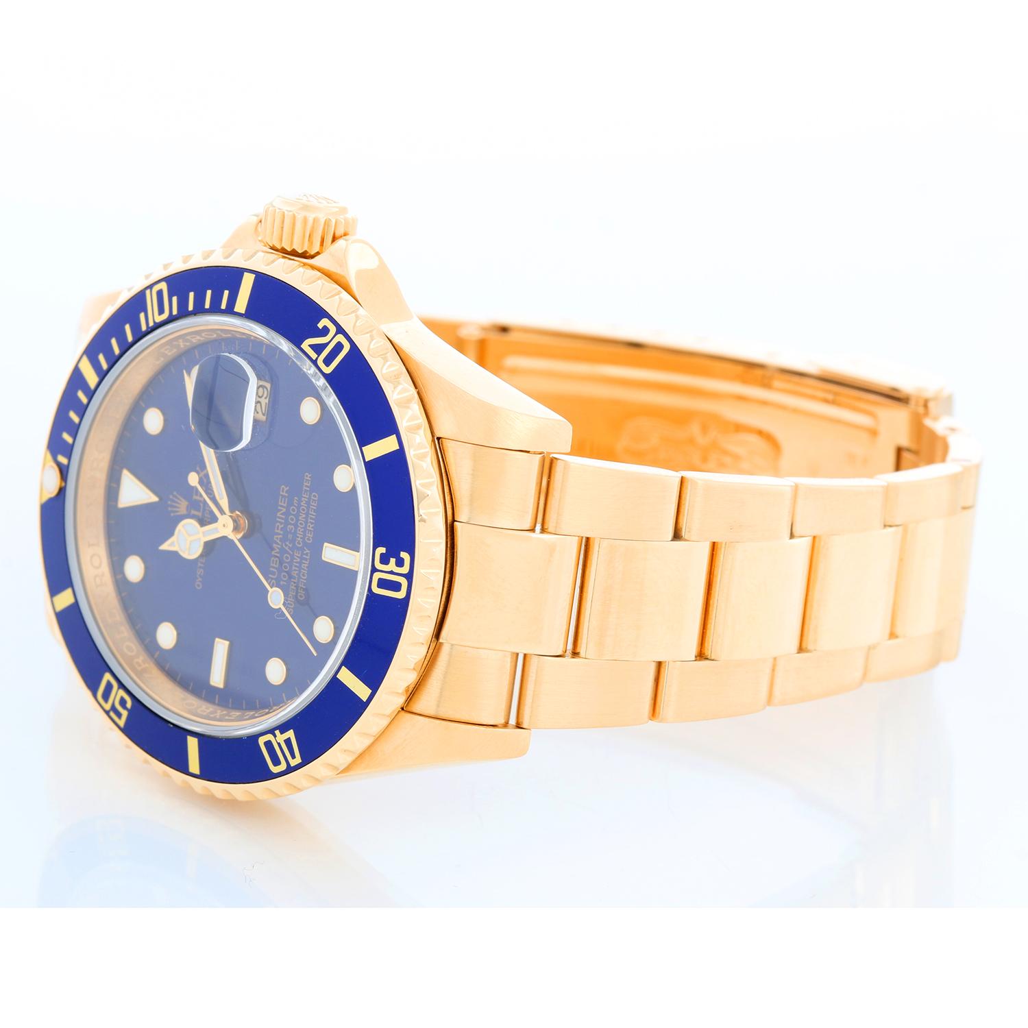 Rolex Submariner 18k Gold Men's Watch 16618 Blue Dial - Automatic winding, 31 jewels, Quickset, sapphire crystal. 18k yellow gold case with rotating bezel with blue insert (40mm diameter) ; Inner bezel engraving. Blue dial. 18k yellow gold Oyster
